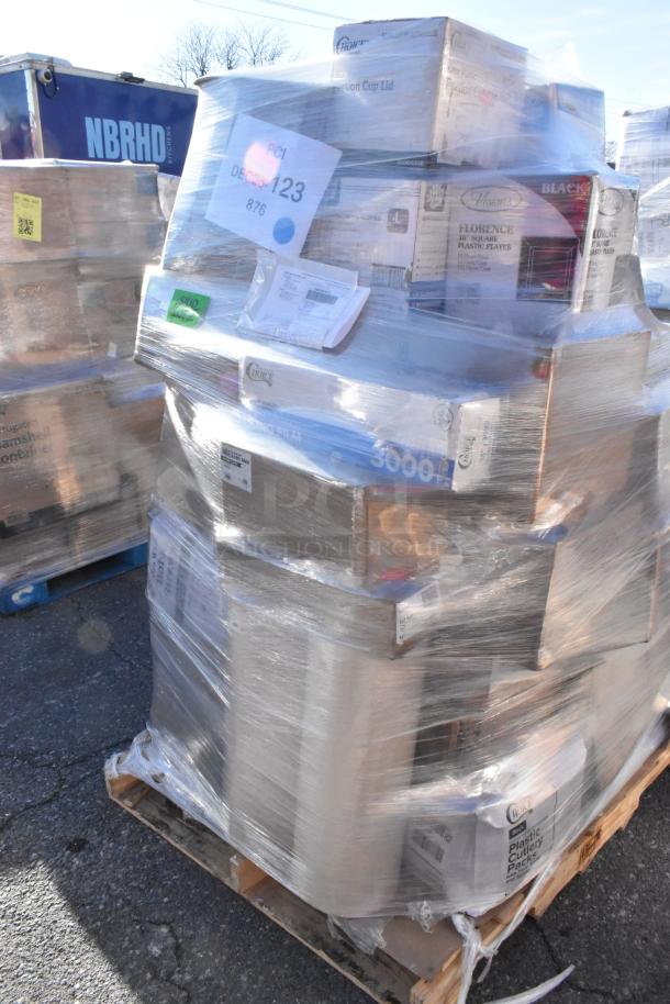 Pallet of 32 new scratch and dent items, including butcher paper, lids, trash bags, and plates, wrapped in plastic. Labels and tags visible.