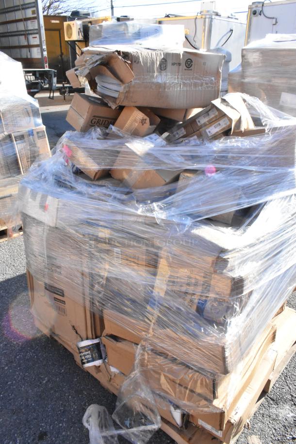 Pallet with 28 scratch and dent items, including a stock pot, cutting board, and glasses, wrapped in plastic. Boxes show wear.