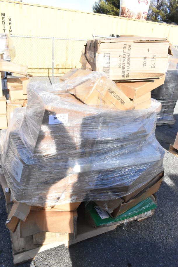 Plastic-wrapped pallet with various boxed kitchen items, labeled "Polypropylene Deli Containers," "Handle With Care." Scratch and dent condition.