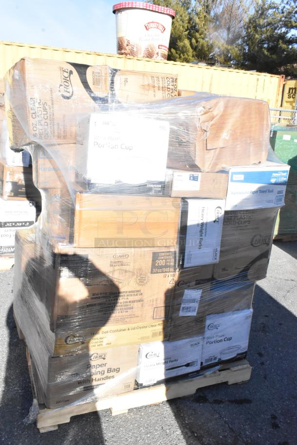 Pallet of new scratch and dent items including portion cups, plates, shopping bags, forks, gloves, wrapped in plastic.