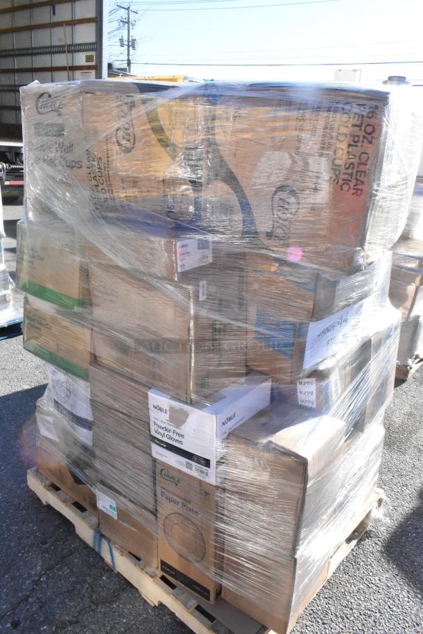 Pallet with 32 new scratch and dent boxes including portion cups, plates, shopping bags, forks, and gloves, wrapped in plastic.