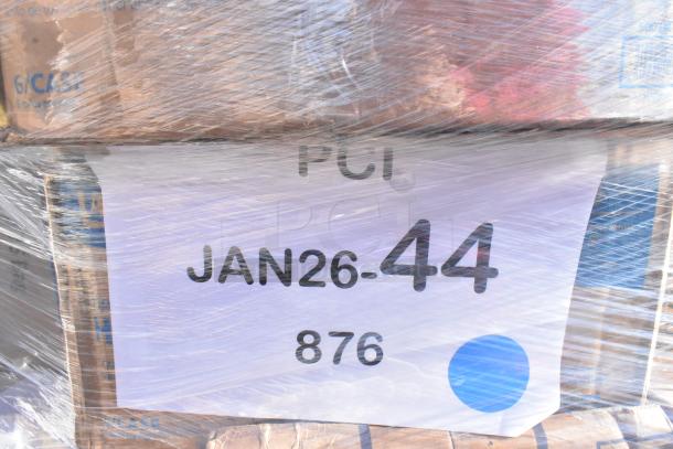 Stacked boxes wrapped in plastic labeled "JAN26-44 876," containing assorted scratch and dent items like portion cups and plates.