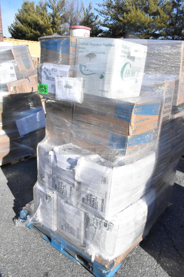 Pallet of 30 scratch and dent items, including napkins and containers, wrapped in plastic. Visible labels indicate "Choice" brand.
