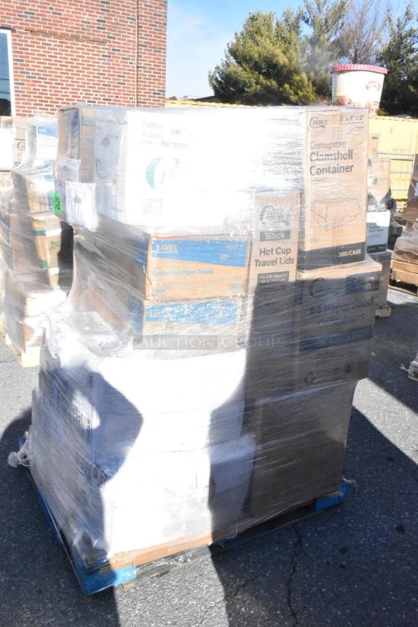 Pallet of new items including containers, napkins, and fry bags, some in original packaging marked as scratch and dent.