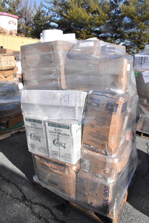 Pallet with shrink-wrapped packages including Choice 2-ply dinner napkins, vented paper lids, and Dart plastic cups. Scratch and dent items.