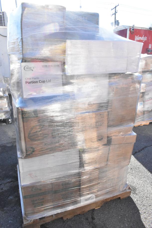 Pallet of 38 new scratch and dent items, including boxed plates, napkins, and gloves, wrapped in plastic for auction.
