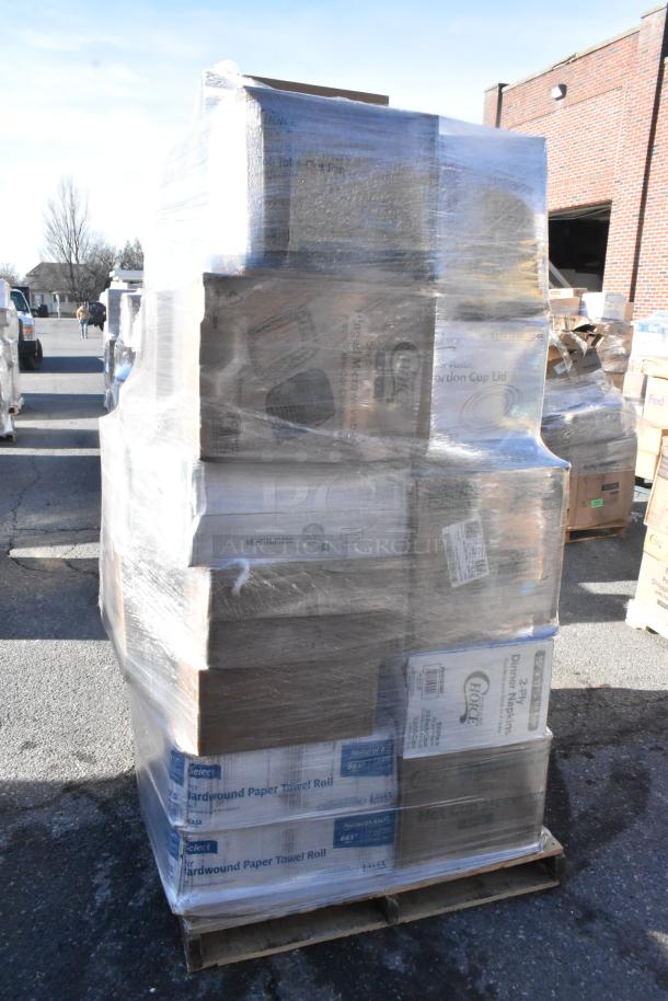 Pallet of assorted brand-new scratch and dent items including plates, towels, gloves, napkins, wrapped in plastic.