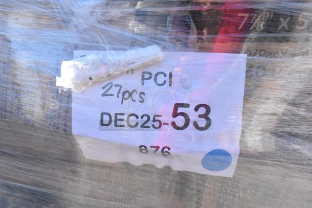 Plastic-wrapped pallet labeled "27pcs DEC25-53" containing 30 scratch and dent items like containers, plates, and trays.