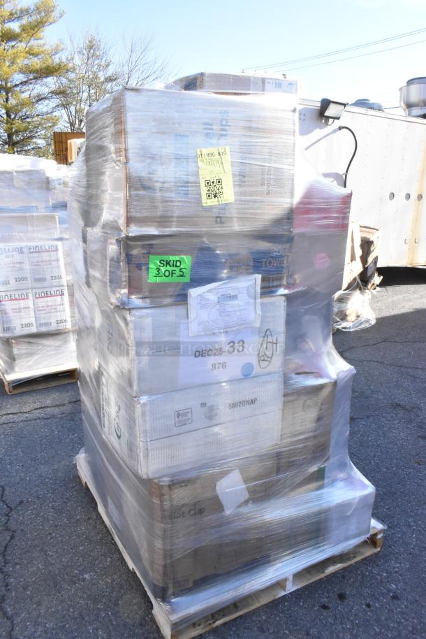Pallet of wrapped boxes labeled "Skid 3 of 5" containing brand new scratch and dent items, including containers, napkins, lids, and hot cups.