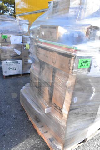 Pallet of various kitchen items, including plates and glasses, wrapped in plastic. Labeled "SKID 3 OF 5."