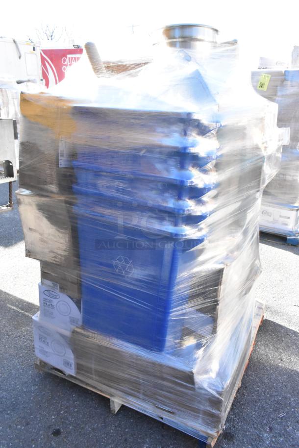 Plastic-wrapped pallet with items including plates, bowl sets, glasses, cutting boards. Some boxes show "Winco" brand. Brand new, scratch and dent.