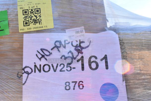 Stack of wrapped boxes labeled "NOV25-161, 40 xpc 32" with shipping tags; contains lids, cups, and more.