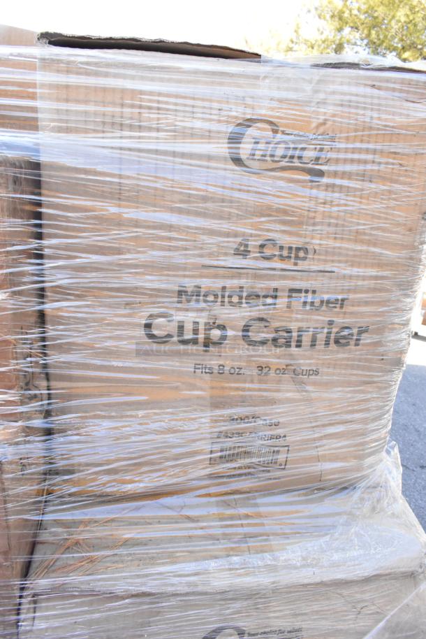 Pallet of assorted scratch and dent items wrapped in plastic, including boxes labeled "Choice 4 Cup Molded Fiber Cup Carrier."