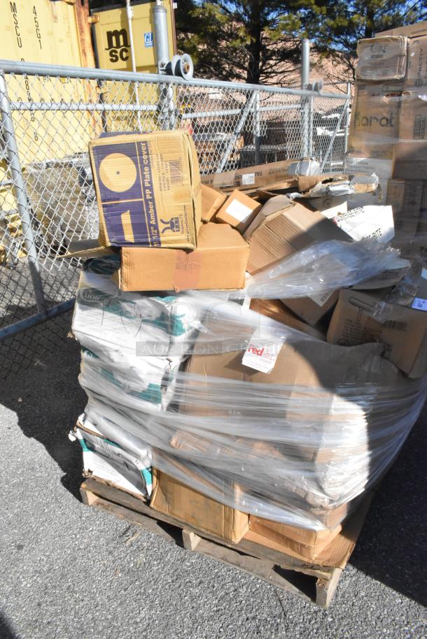 Pallet of 22 new scratch and dent items including plate covers and chafers, wrapped in plastic. Multiple boxes visible.