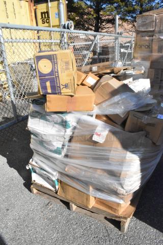 Pallet of 22 new scratch and dent items including plate covers and chafers, wrapped in plastic. Multiple boxes visible.