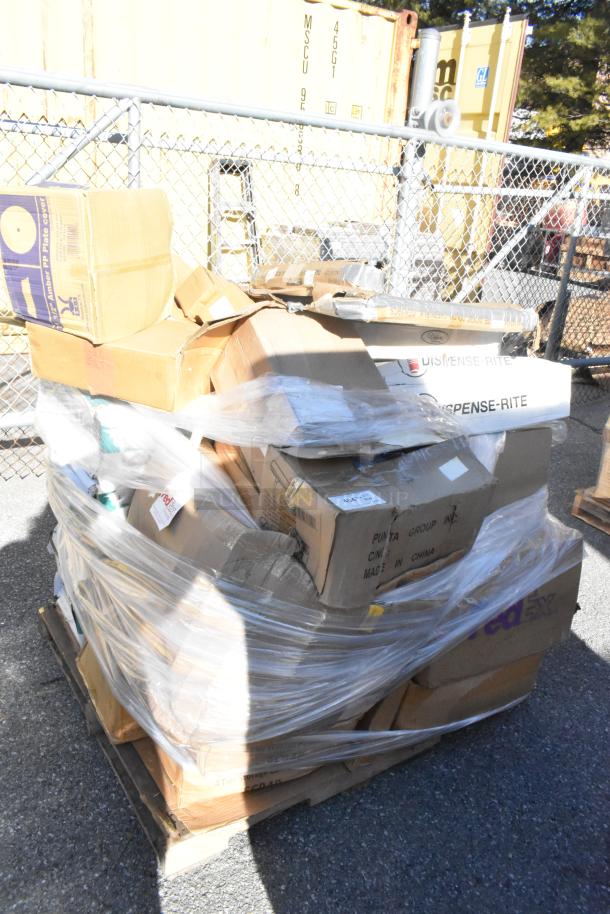 Pallet with new scratch and dent items, including plate covers and chafers, wrapped in plastic. Boxes show storage wear.