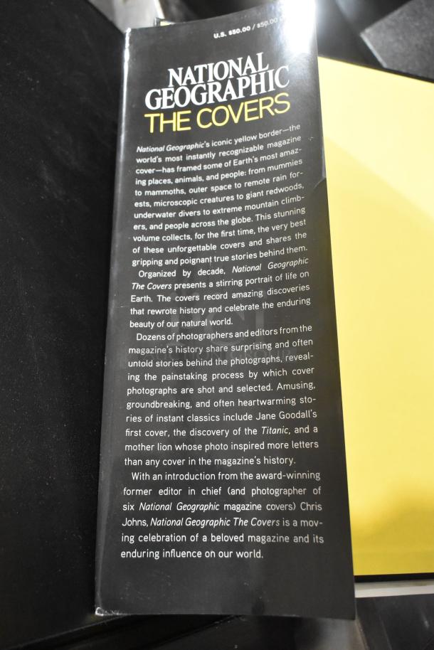 National Geographic "The Covers" book, detailing iconic magazine covers. Excellent condition, priced at $50.