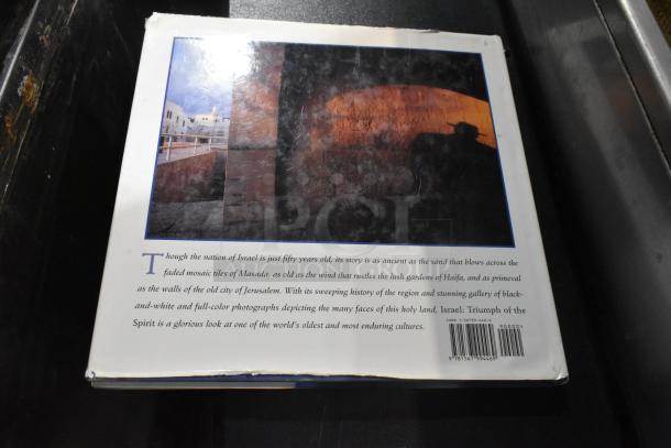 Back cover of a book from a collection of 13, featuring images and descriptive text about Israel. Includes barcode with ISBN 1-56799-446-9. Slight wear visible at edges.