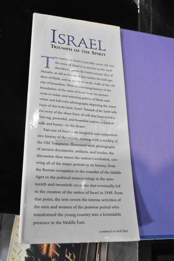Thirteen assorted books including "Israel: Triumph of the Spirit," showcasing historical insights and illustrations. Good condition.
