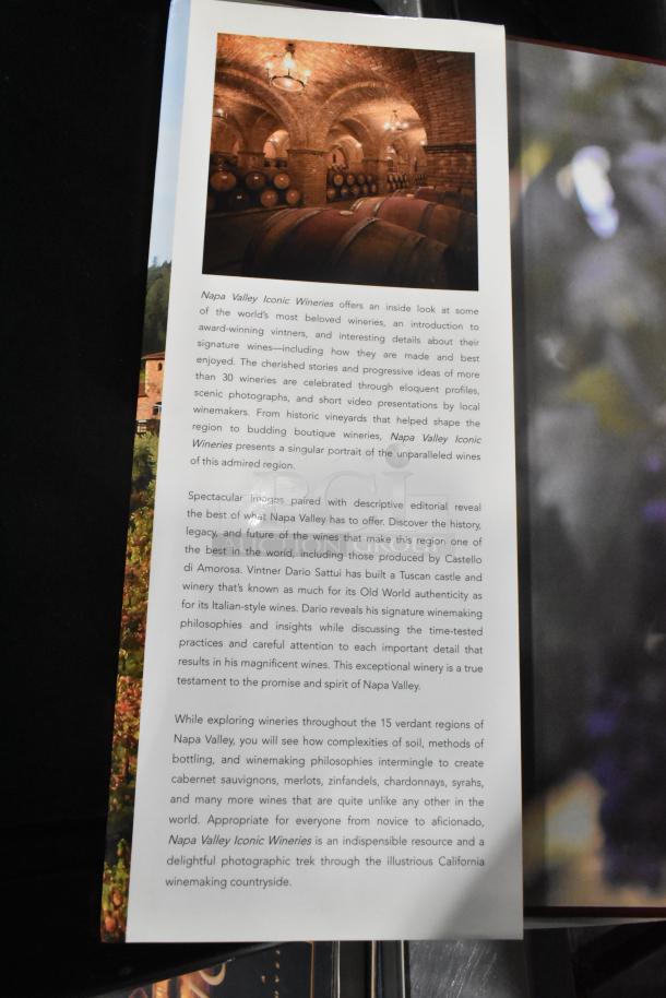 Thirteen various books including "Napa Valley Iconic Wineries." Features winery profiles and wine insights. Appears in good condition.