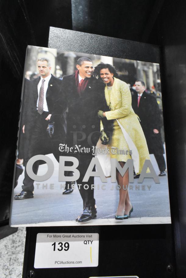 "The New York Times: Obama - The Historic Journey" book, hardcover, black and white cover, excellent condition.