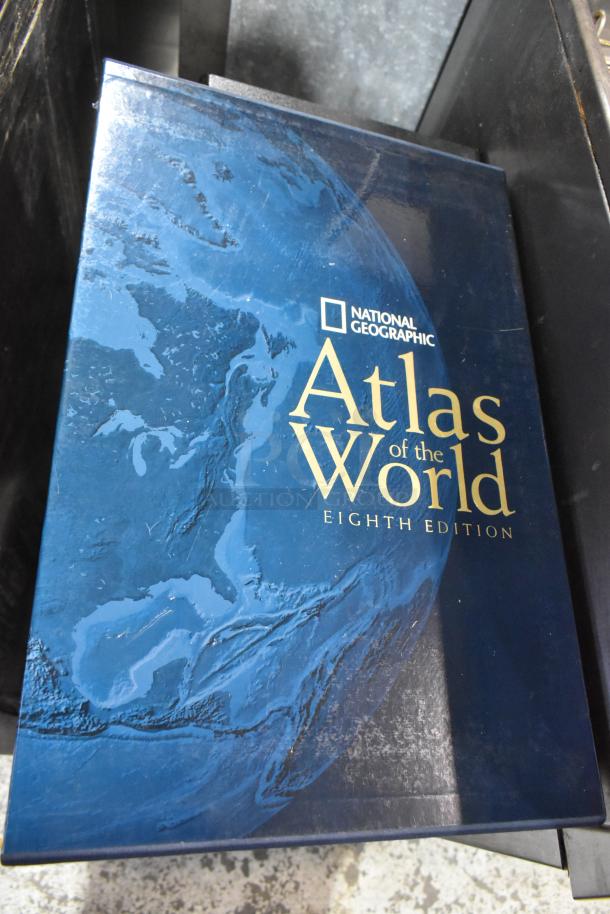 National Geographic Atlas of the World, Eighth Edition, hardcover. Blue cover with world map design, used condition.