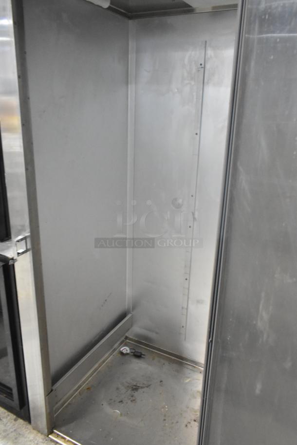 Traulsen ARI132HUT-FHS stainless steel commercial roll-in rack cooler, 115 volts, 1 phase, spacious interior, used condition.