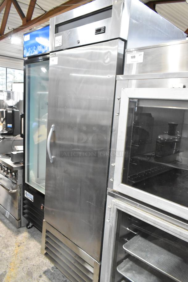 Ikon KB27F stainless steel single door commercial freezer, on casters, 115V, 1 phase, good condition, visible logo.