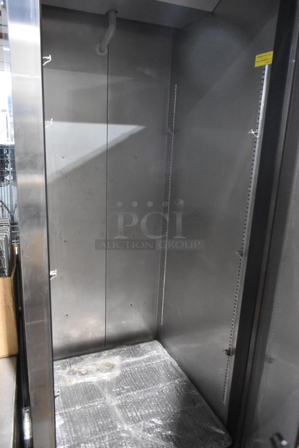 2023 Kutano KUTR1SS stainless steel single door reach-in cooler on casters, 115V, commercial grade, interior view.