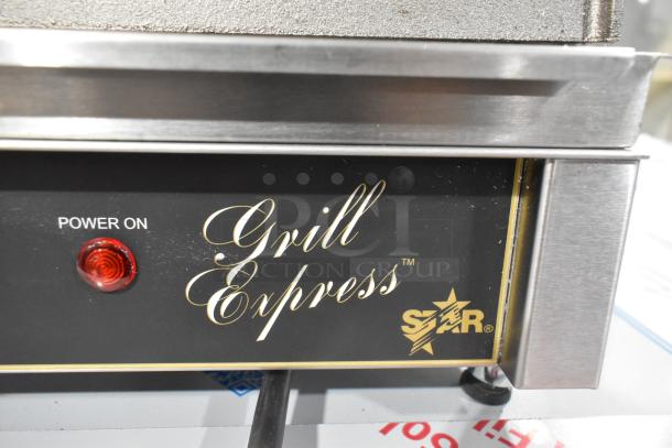 Star GX10IS Stainless Steel Panini Press, commercial-grade, 120 volts, with "Grill Express" branding and power indicator.