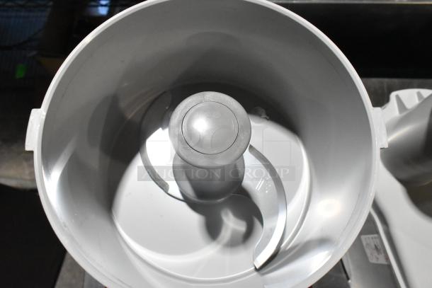 Brand new Robot Coupe R 2 Dice food processor with 3 Qt. gray bowl and S blade, shown in pristine condition.