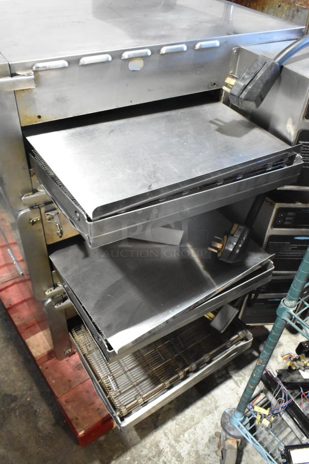 Turbochef HhC2020 stainless steel commercial conveyor ovens. Electric, 208/240V, 3-phase. Appears in used condition.