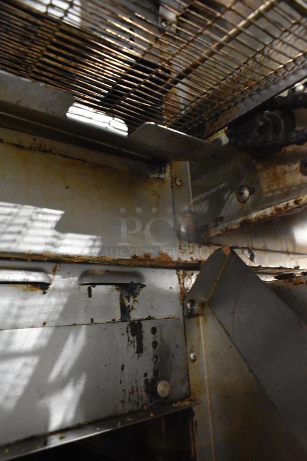 2017 Turbochef HhC2020 stainless steel rapid cook conveyor oven interior with visible wear, 208/240 volts, 3 phase.