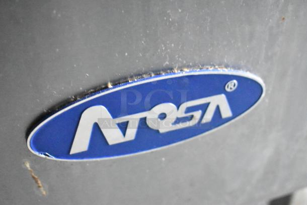 Atosa logo on commercial kitchen equipment in the mobile food trailer.