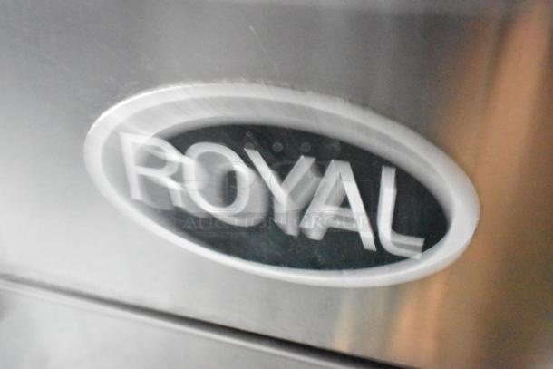 Close-up of the Royal logo on a stainless steel appliance, part of a fully equipped 24' fast food trailer from Stuff4less.