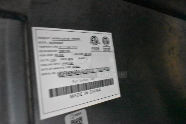 Label on dark background showing product information for a freezer. Includes model ARXF-49F, specs, and "Made in China".