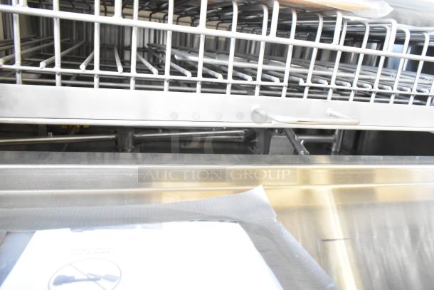 Douglas SD-20-ELEL commercial pot and pan washer, front load design, stainless steel racks, excellent condition.