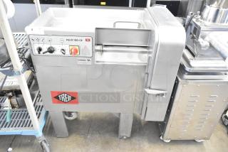 Treif Felix 100-CE industrial food dicer, floor style, 800kg/hr, 208/250V, 3-phase. Features control panel and Treif branding.
