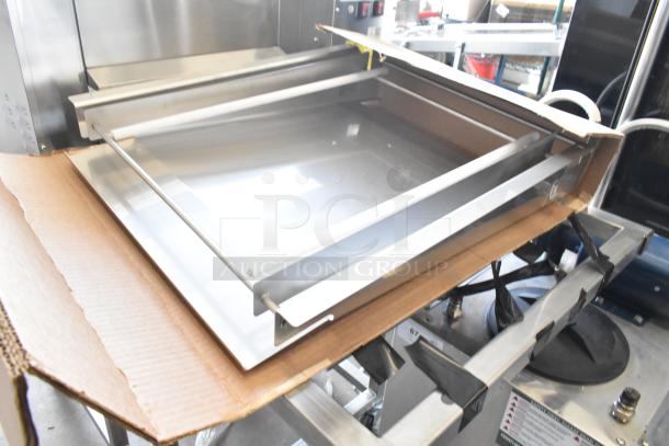 Belshaw Adamatic TG-50 stainless steel thermoglazing station, commercial casters, 208V, 1 phase, like new condition.