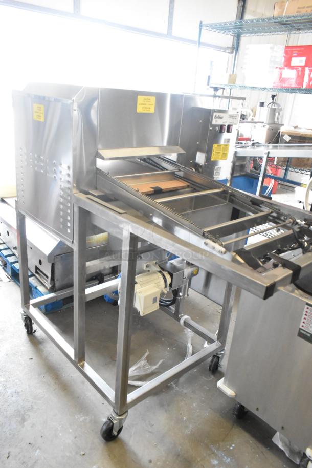 Belshaw Adamatic TG-50 Thermoglazing Station, stainless steel, commercial casters, 208V, 1 phase, excellent condition.