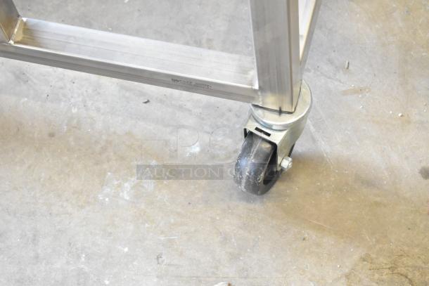 Belshaw Adamatic TG-50 thermoglazing station, stainless steel, commercial casters, 208V, 1 phase. Model: TG-50.