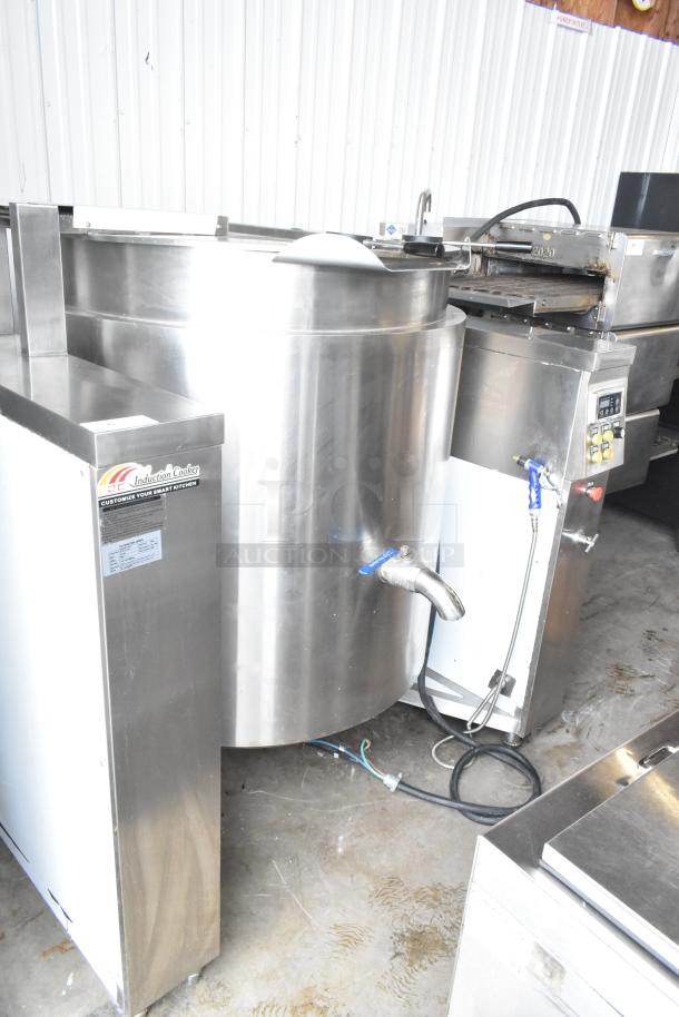 Industrial CZC-13F tilting cooking kettle mixer. Stainless steel, induction style, 380V, 3 phase. Includes control panel and outlet.