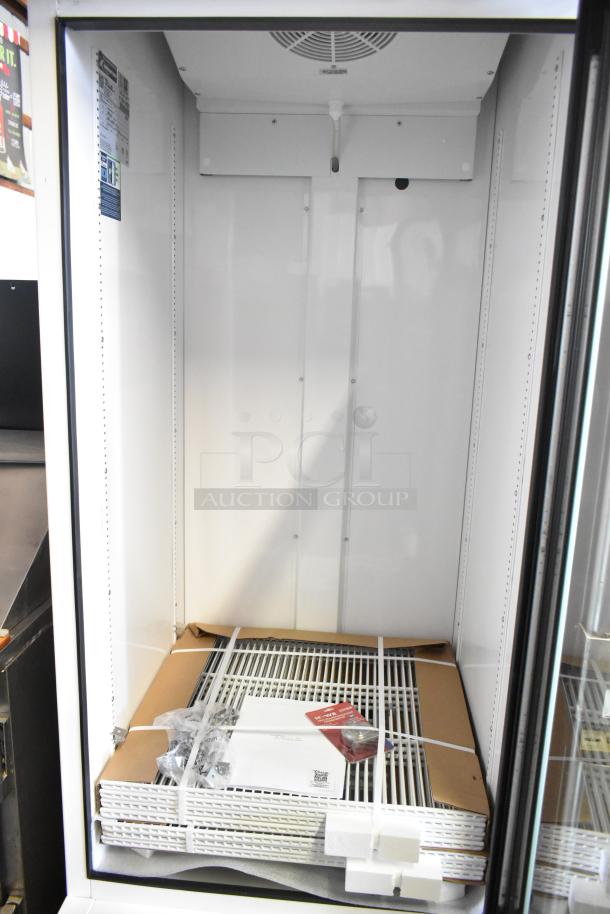 True TSCI-600R-G-PH single door cooler, 2025 model, poly coated racks, new with scratch/dent, 115V, 1 phase power.