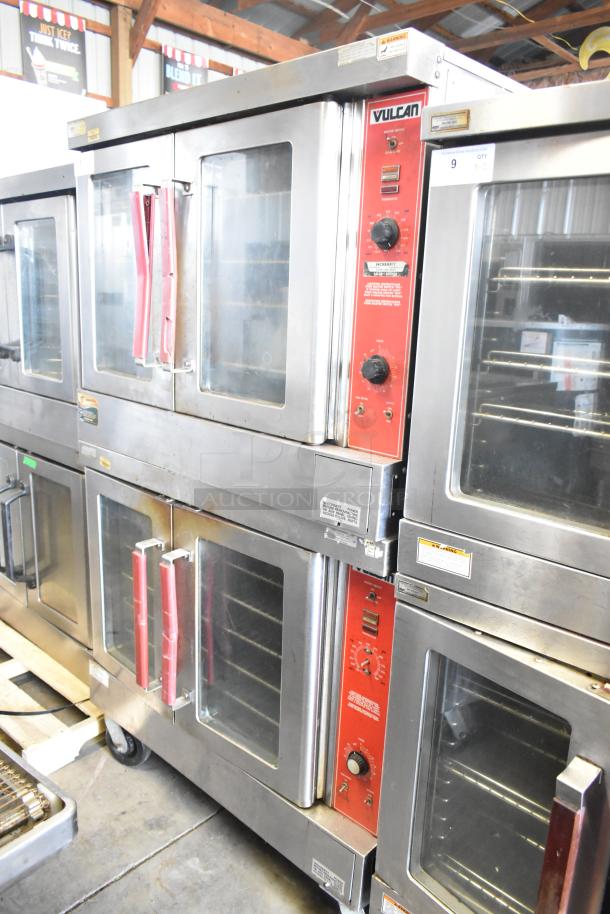 2 Vulcan VC4GD-10 commercial convection ovens with view-through doors and thermostatic controls, silver with red accents.