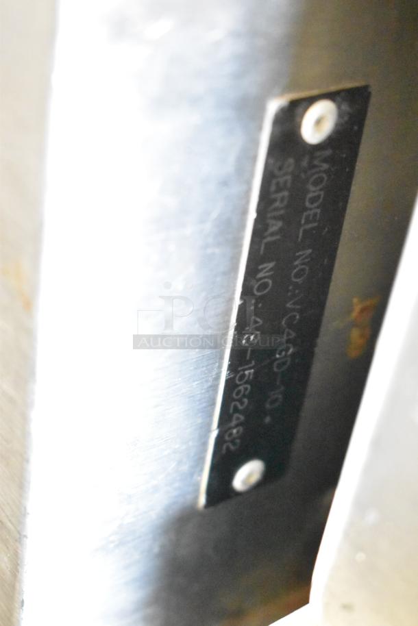 Serial plate of Vulcan VC4GD-10 convection oven showing model and serial number details.