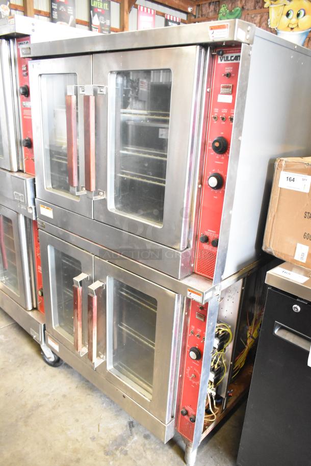 2 Vulcan commercial full-size convection ovens, view-through doors, thermostatic controls, stainless steel, good condition.
