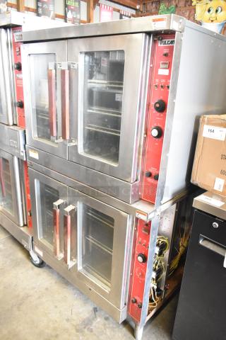 2 Vulcan commercial full-size convection ovens, view-through doors, thermostatic controls, stainless steel, good condition.