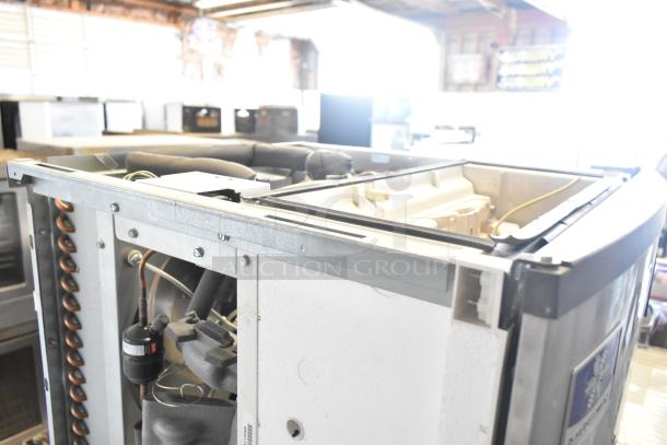 2021 Manitowoc IYT0420A-161X ice machine and SPA160 dispenser, slightly used, 115V, 1 phase, visible internal components.