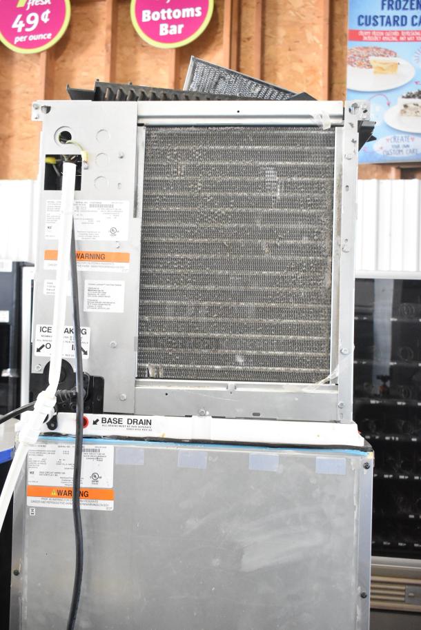 2021 Manitowoc IYT0420A-161X Ice Machine and SPA160 Dispenser, 115V, 1 Phase, with visible warning labels and base drain tag.