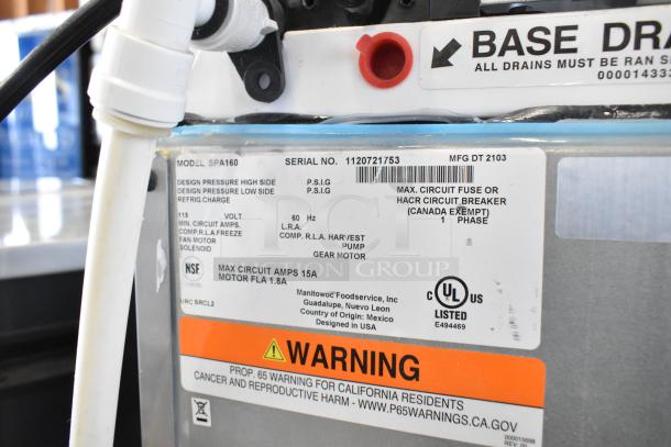 2021 Manitowoc IYT0420A-161X ice machine on SPA160 dispenser; 115V, 1 phase; serial 1120721753; warning labels visible.